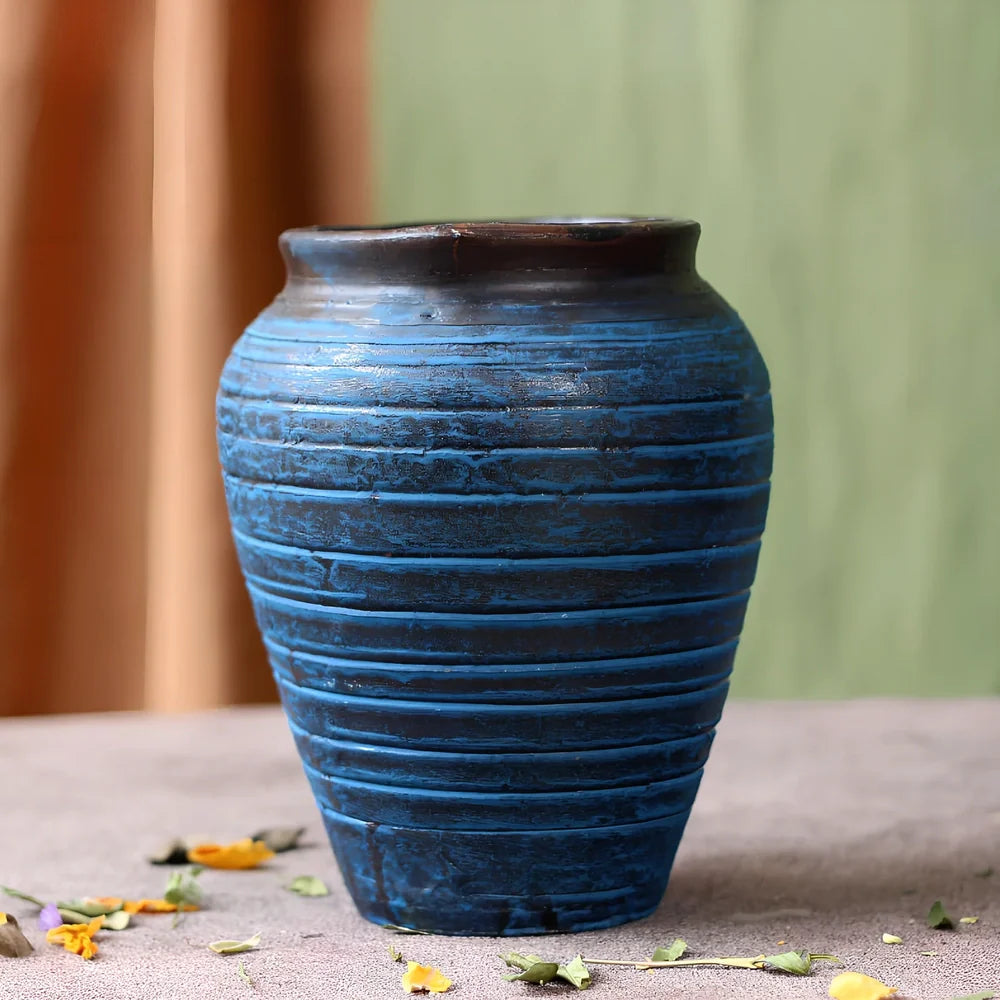 Ceramic mosaic vase with dried flower arrangement, handcrafted surface detailing