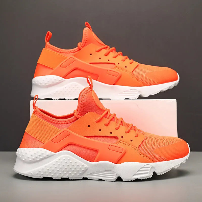 Men's low top casual shoes with mesh upper, cross shoulder straps, and flat heel in fluorescent colours