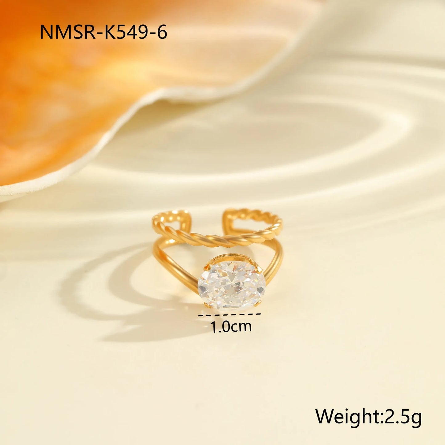 Gold electroplated stainless steel ring with heart shape design and open mouth fitting