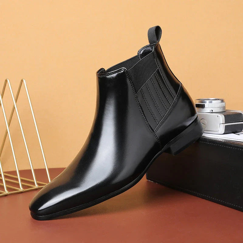 Sleek and sophisticated men's Chelsea boots with pointed toe and square heel design in black and brown colors