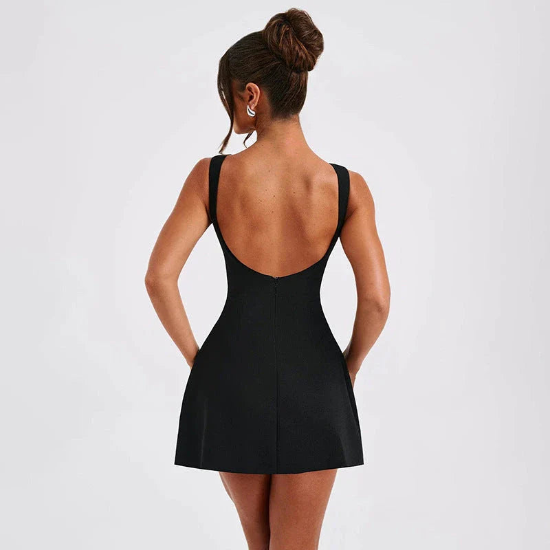 Alluring backless mini dress in sleek and stylish summer designs with a figure-flattering fit and range of chic color options
