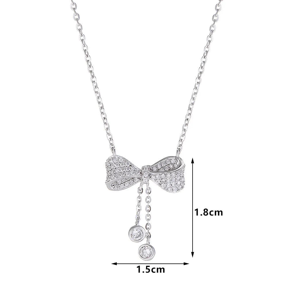 Silver bow pendant necklace with O-ring chain, adjustable 40-45cm length, 925 sterling silver composition
