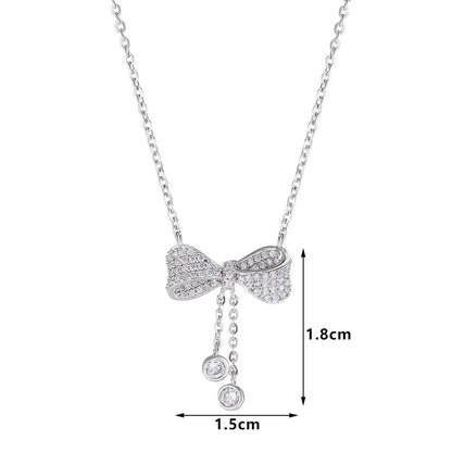 Silver bow pendant necklace with O-ring chain, adjustable 40-45cm length, 925 sterling silver composition