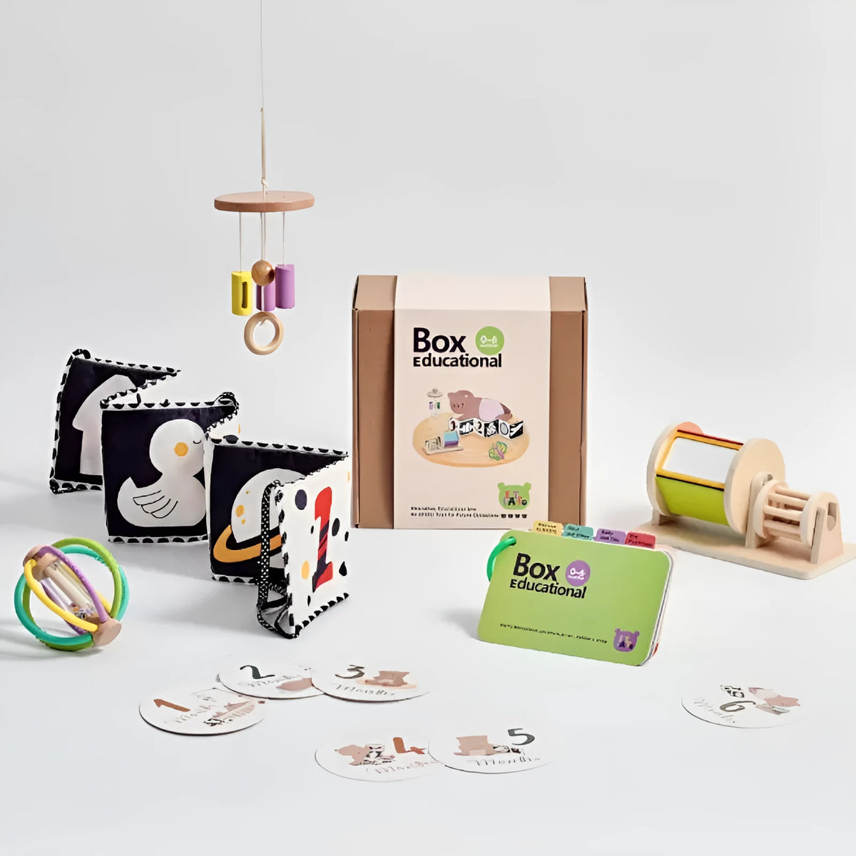 Wooden Montessori rattle toy with black and white cards, ball chime, and colour box for children aged 4-6 years