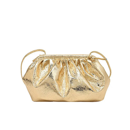 Simple hair clip shoulder crossbody bag in shell shape with visible sewing lines, shown in rose red colour.