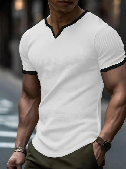 V-neck colour-block waffle texture outdoor sports T-shirt in polyester fabric on a neutral background.