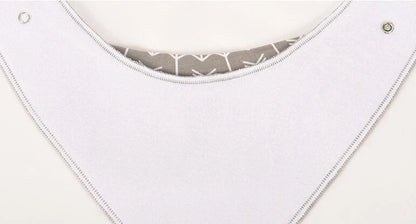 Set of four cotton baby bibs with arrow and wave designs for mess-free feeding