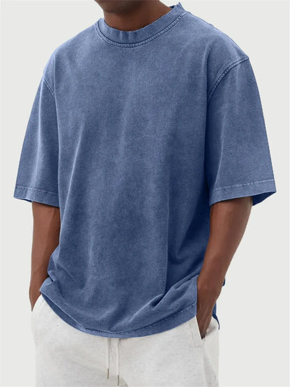 Men's loose fit stone-washed distressed short sleeve t-shirt in solid colour