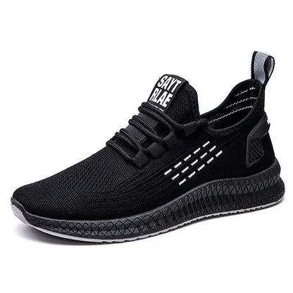 Men's black casual sports shoes with cross-strap detail and a Flying Weave upper, shown on a white background.