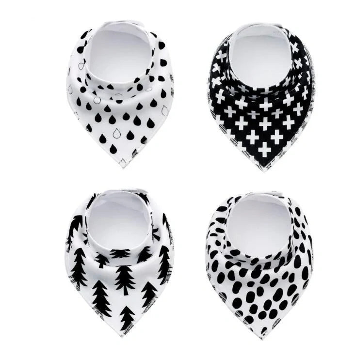 Set of four cotton baby bibs with arrow and wave designs for mess-free feeding