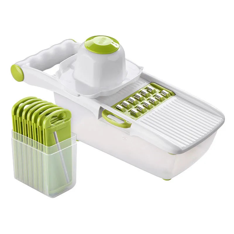 Orange multifunctional vegetable cutter kitchen tool with mandoline blades on a countertop.