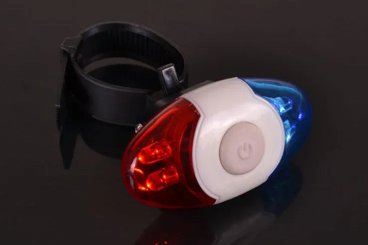 Red and blue LED tail light with adjustable mounting base shown in horizontal and vertical positions.