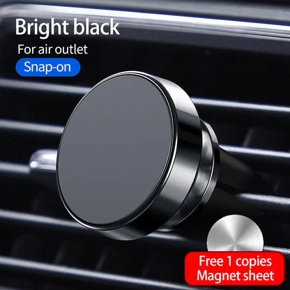 Magnetic car phone holder mounted on dashboard showing smartphone attachment and 360-degree rotation mechanism