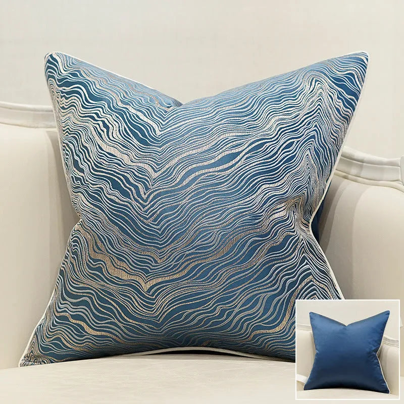 Corrugated stripe and diamond pattern cushion covers in green, blue, grey, and beige colours.