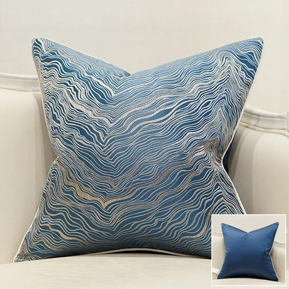 Corrugated stripe and diamond pattern cushion covers in green, blue, grey, and beige colours.