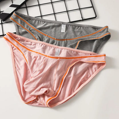 Men's ice silk modal underwear with butt-lift design shown in multiple colour options