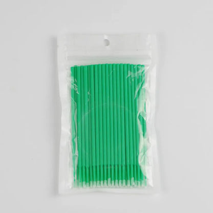 Disposable micro applicator brushes with coloured plastic handles and bendable cotton swab tips