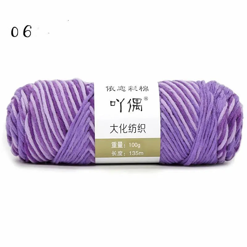 Eight strands of gradient milk cotton wool in a ball, showing multiple colour options for hand knitting.