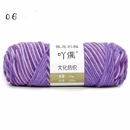 Eight strands of gradient milk cotton wool in a ball, showing multiple colour options for hand knitting.