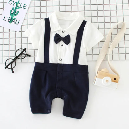 Baby bow gentleman climbing suit in cotton with short sleeves and buckle closure, shown in beard gentleman style