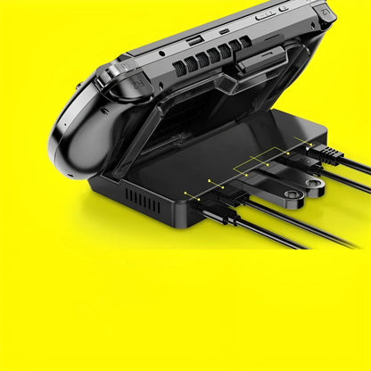 GPD WIN4 handheld game console sitting in a black docking base expander showing multiple ports on the front.