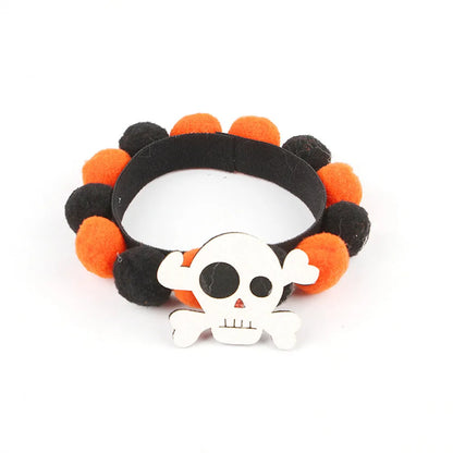 Halloween pet collar with fur ball decoration in pumpkin design