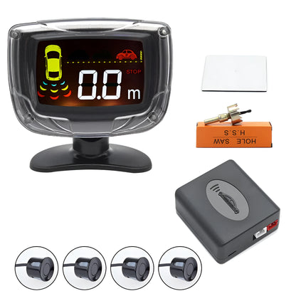 Wireless reversing sensor system showing main display unit, four embedded probes, and installation accessories.