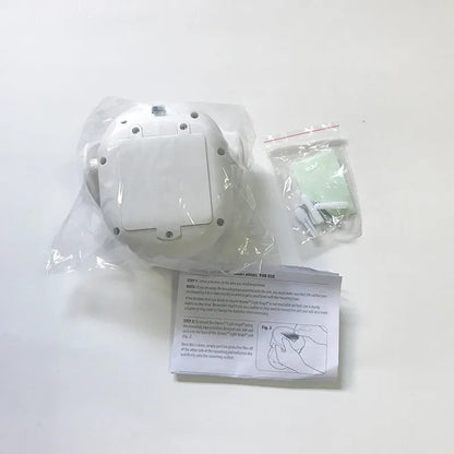 White angel design induction night light on table showing dimensions