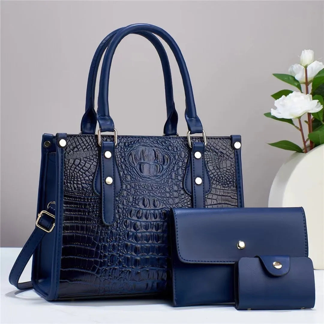 Contrast colour three-piece bag set showing bucket-shaped crossbody bag, wallet, and card holder in coordinated colours
