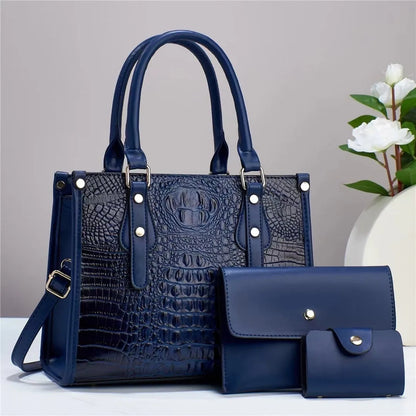 Contrast colour three-piece bag set showing bucket-shaped crossbody bag, wallet, and card holder in coordinated colours