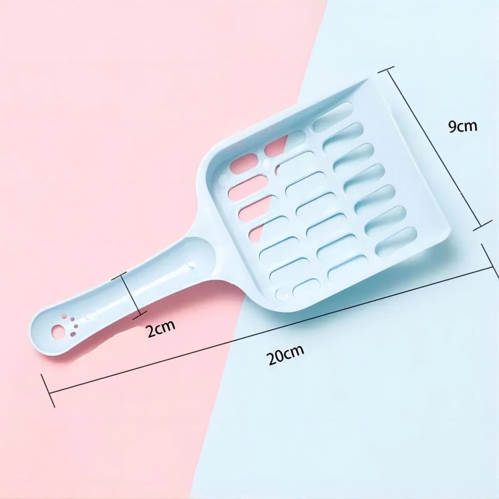 Plastic cat litter scoop in blue on a white background, showing handle and perforated scoop area.