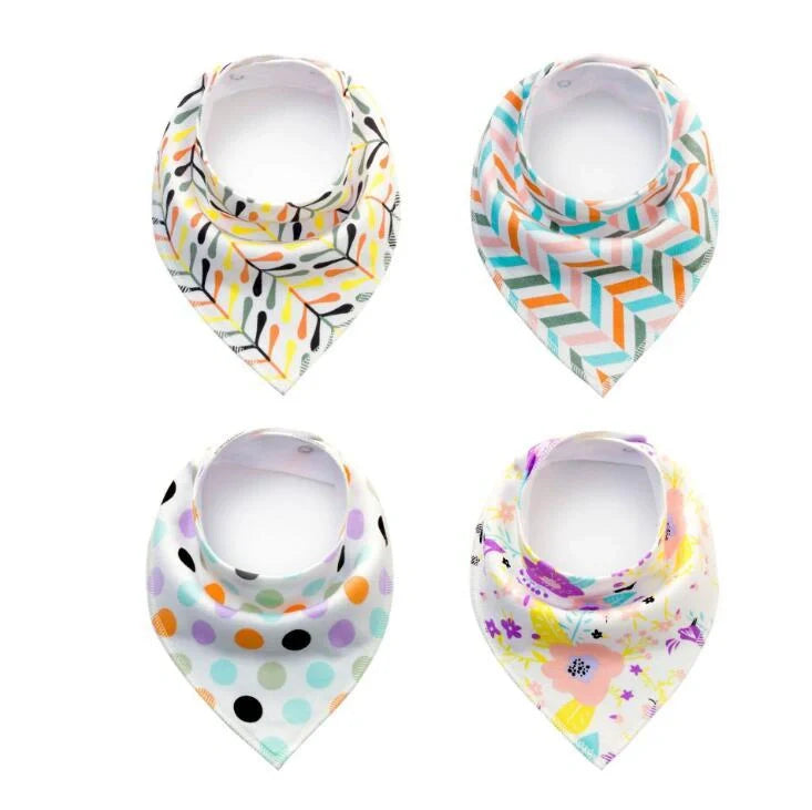 Set of four cotton baby bibs with arrow and wave designs for mess-free feeding