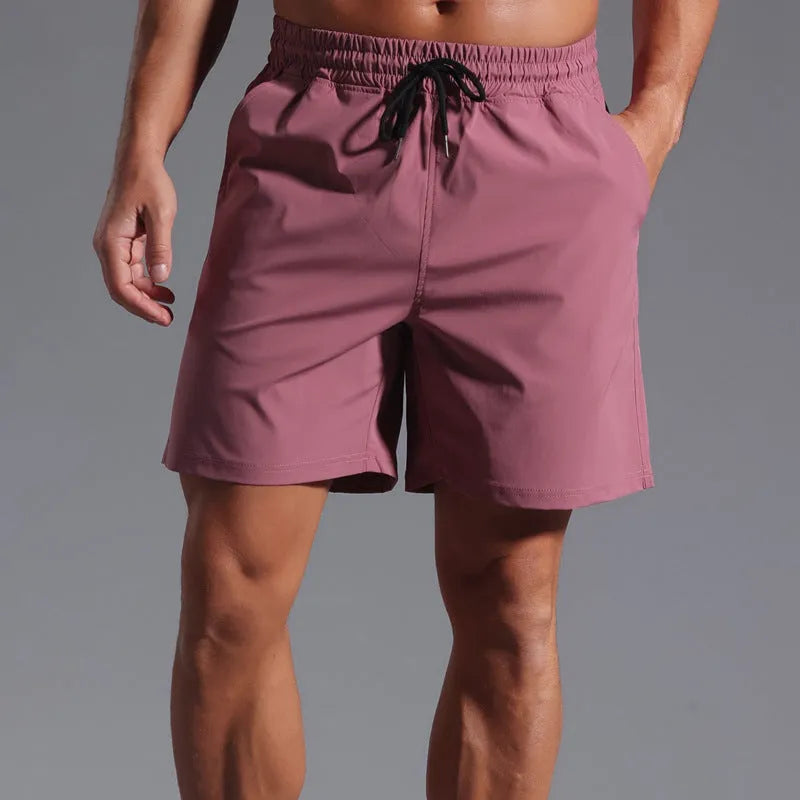 Men's loose-fitting casual shorts in quick-drying polyester available in four colours