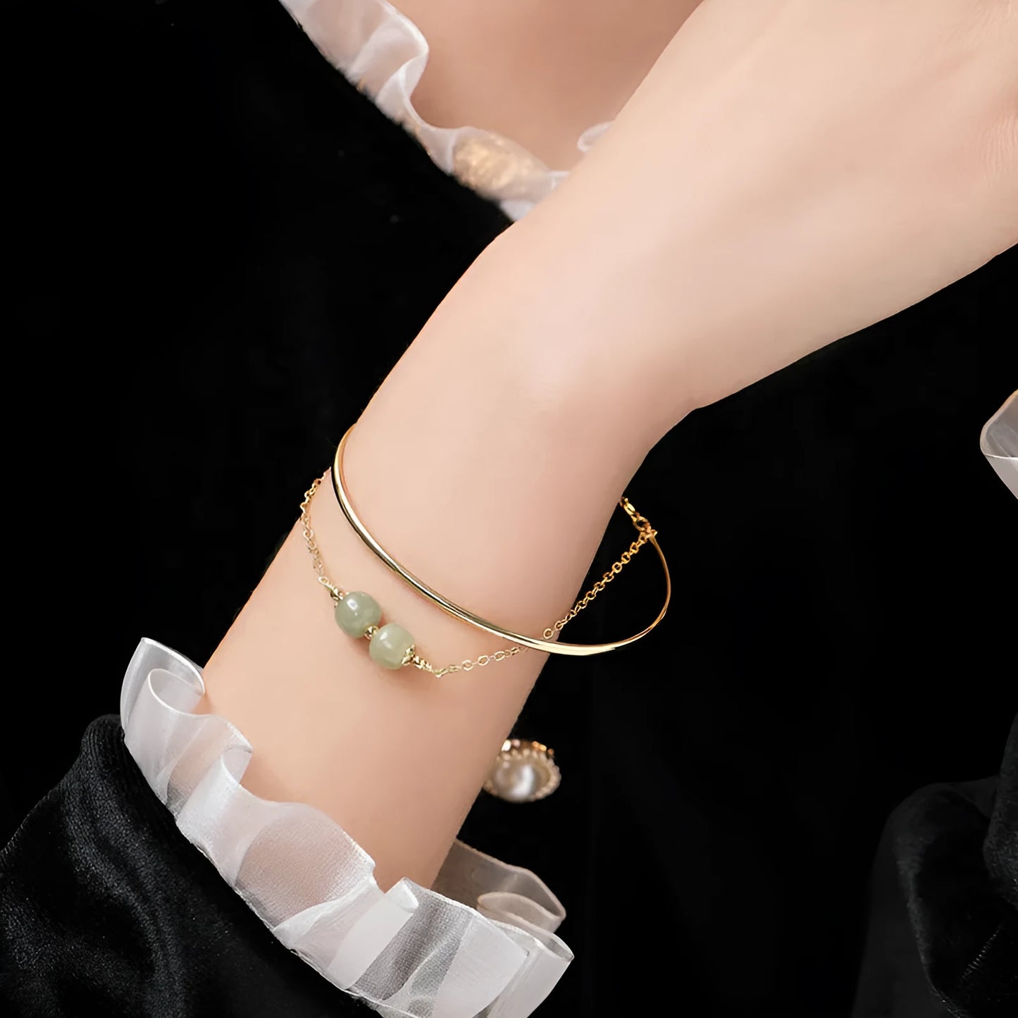 Women's Hetian jade lucky beads bracelet with gold inlay, shown in faux two-piece design.