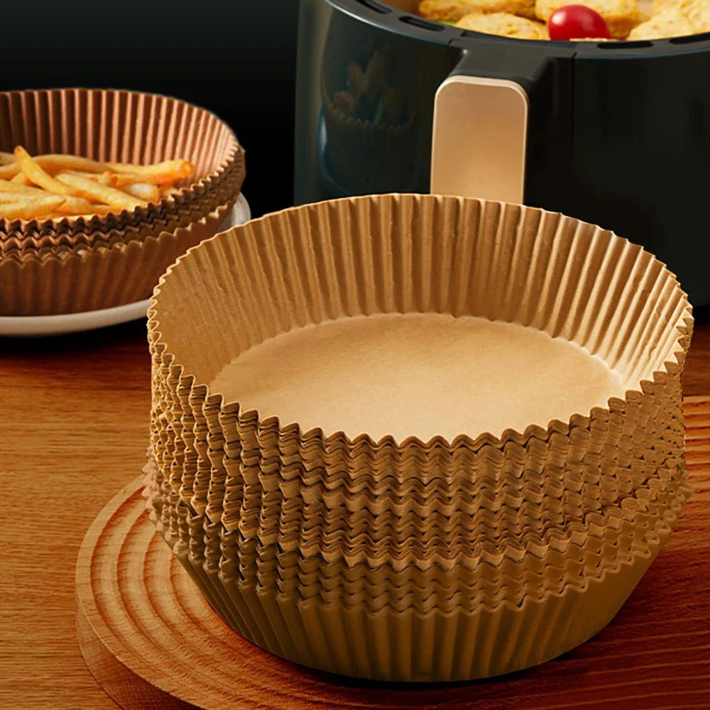 Disposable air fryer liners made from high-quality parchment paper, designed to keep your air fryer clean and your meals healthy