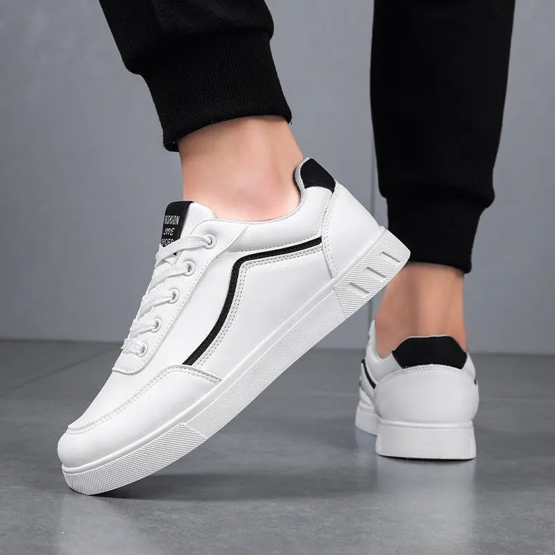 Korean trendy wild sneakers in black and white, low-top design with mesh lining and rubber sole.