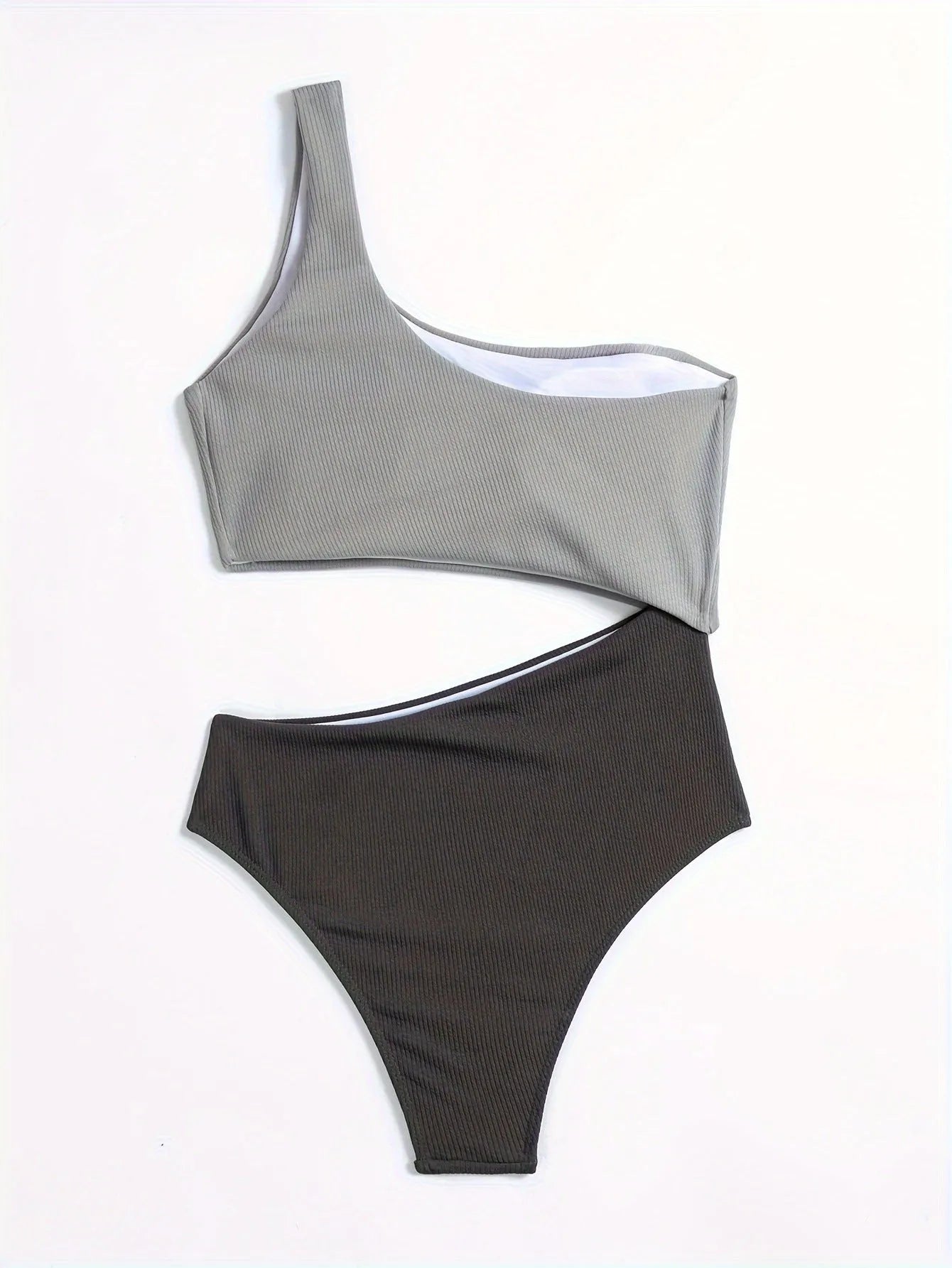 Light grey one-shoulder one-piece swimsuit on a mannequin, showing the single strap and solid colour design.
