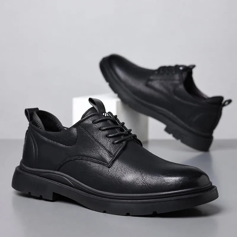 Men's black and brown leather shoes with rubber sole and sewing line detail for business and casual wear