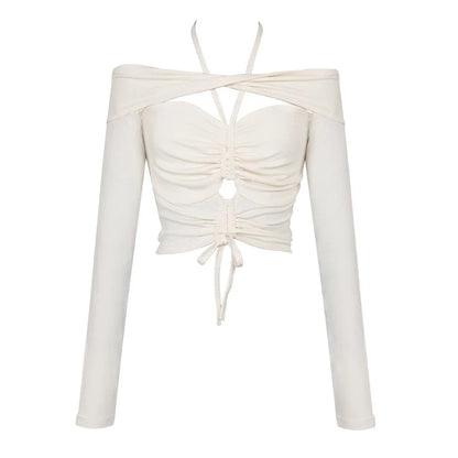 Off-shoulder blouse with drawstring waist, cut-out details, and long sleeves in a warm apricot colour