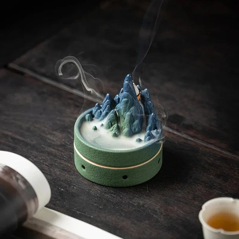 Ceramic incense burner with flowing water design, creating a serene and calming ambiance in the living space