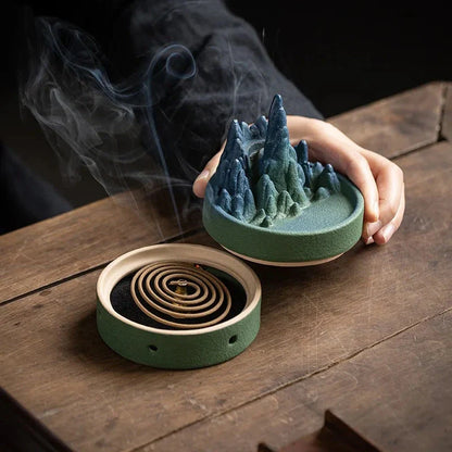 Ceramic incense burner with flowing water design, creating a serene and calming ambiance in the living space