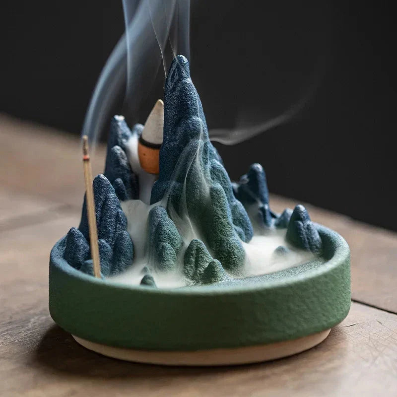 Ceramic incense burner with flowing water design, creating a serene and calming ambiance in the living space