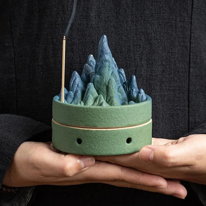 Ceramic incense burner with flowing water design, creating a serene and calming ambiance in the living space