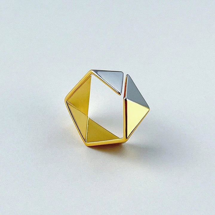 18K gold brass ring with a meteorite-inspired design, showcasing a unique and sophisticated accessory