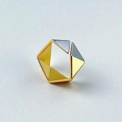 18K gold brass ring with a meteorite-inspired design, showcasing a unique and sophisticated accessory