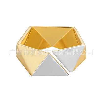 18K gold brass ring with a meteorite-inspired design, showcasing a unique and sophisticated accessory