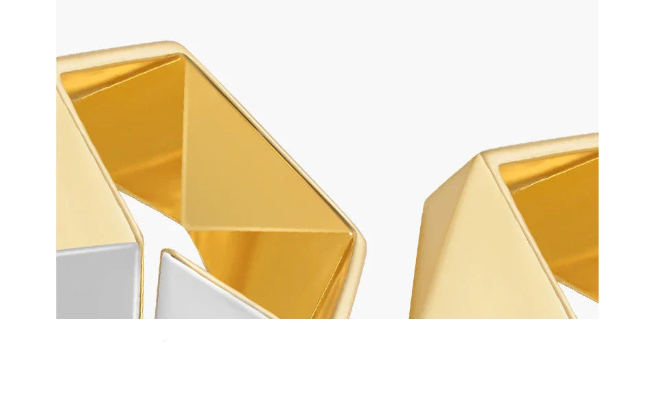 18K gold brass ring with a meteorite-inspired design, showcasing a unique and sophisticated accessory