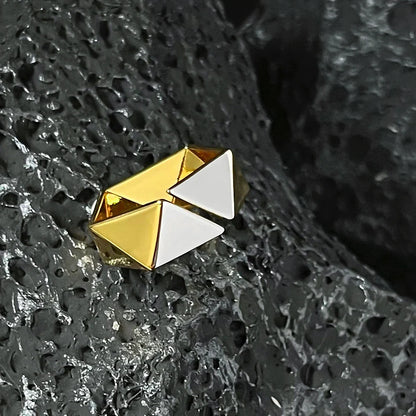 18K gold brass ring with a meteorite-inspired design, showcasing a unique and sophisticated accessory