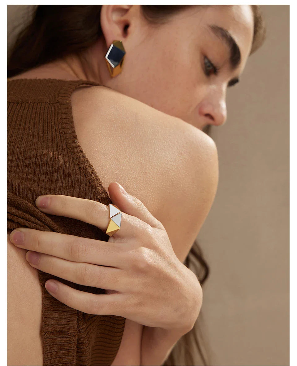 18K gold brass ring with a meteorite-inspired design, showcasing a unique and sophisticated accessory