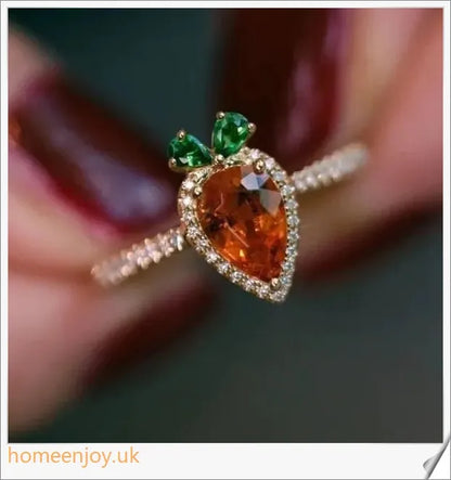 A close-up image of a copper ring with a whimsical carrot-shaped design and micro-inlaid details, showcasing a playful and charming accessory.